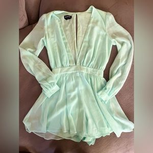 Bebe romper with plunge neckline size 2